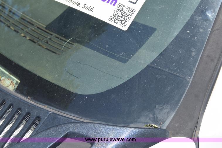 image for item L2708 2005 Chevrolet Silverado 2500HD Crew Cab flatbed pickup truck