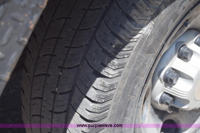 image for item L2708 2005 Chevrolet Silverado 2500HD Crew Cab flatbed pickup truck