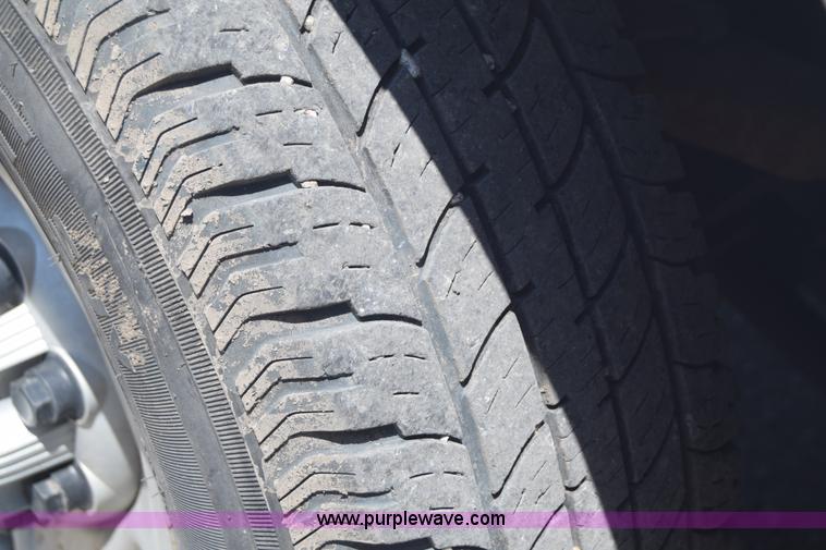 image for item L2708 2005 Chevrolet Silverado 2500HD Crew Cab flatbed pickup truck