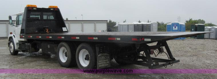 image for item AO9124 2003 Freightliner FL80 roll back truck