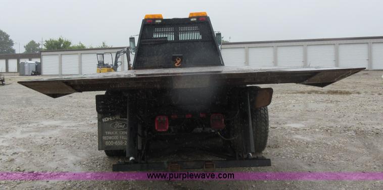 image for item AO9124 2003 Freightliner FL80 roll back truck