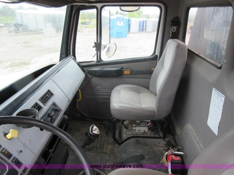 image for item AO9124 2003 Freightliner FL80 roll back truck