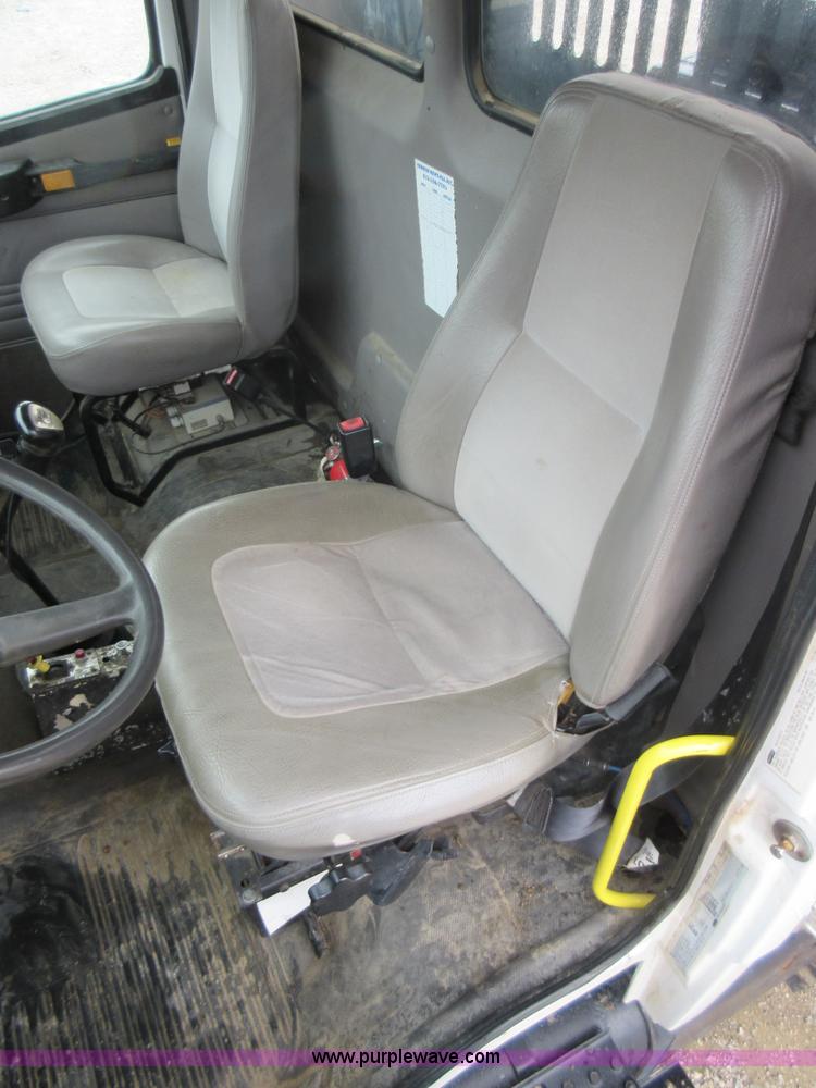 image for item AO9124 2003 Freightliner FL80 roll back truck