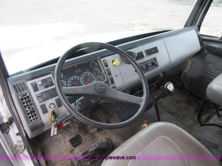 image for item AO9124 2003 Freightliner FL80 roll back truck