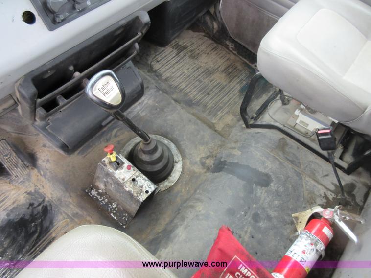 image for item AO9124 2003 Freightliner FL80 roll back truck