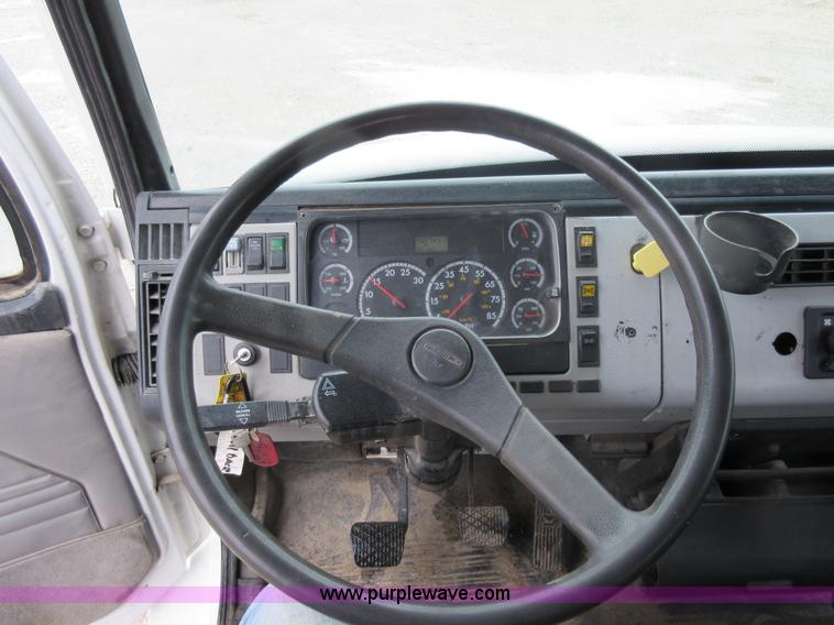 image for item AO9124 2003 Freightliner FL80 roll back truck