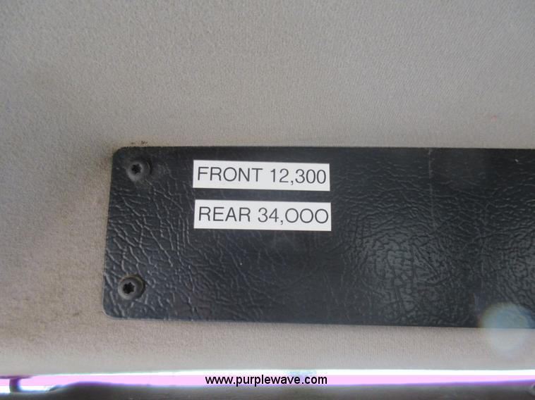 image for item AO9124 2003 Freightliner FL80 roll back truck