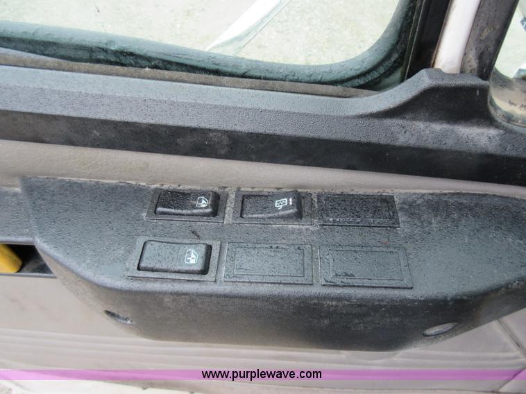 image for item AO9124 2003 Freightliner FL80 roll back truck