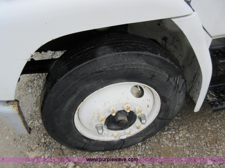 image for item AO9124 2003 Freightliner FL80 roll back truck