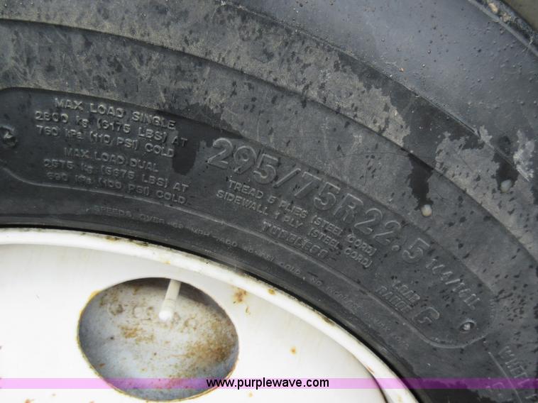 image for item AO9124 2003 Freightliner FL80 roll back truck