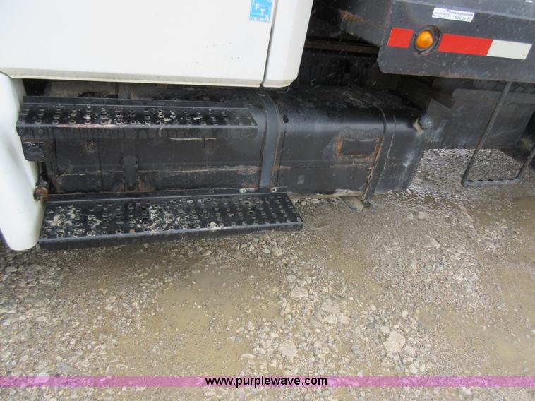 image for item AO9124 2003 Freightliner FL80 roll back truck