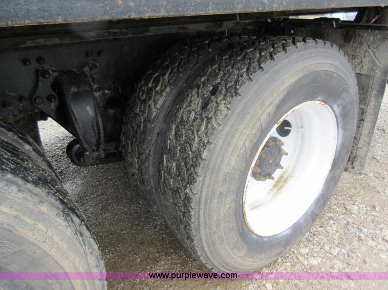 image for item AO9124 2003 Freightliner FL80 roll back truck