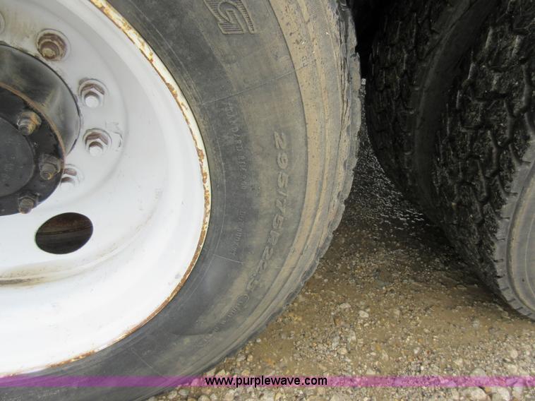 image for item AO9124 2003 Freightliner FL80 roll back truck