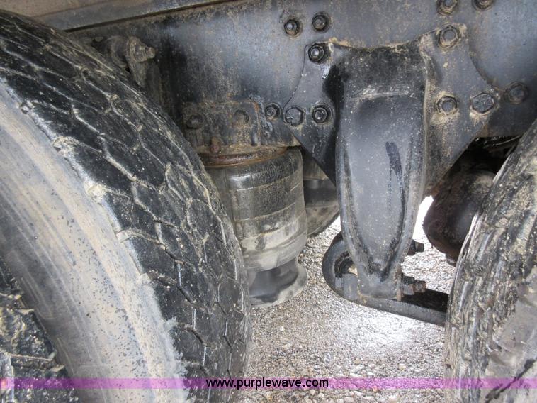 image for item AO9124 2003 Freightliner FL80 roll back truck