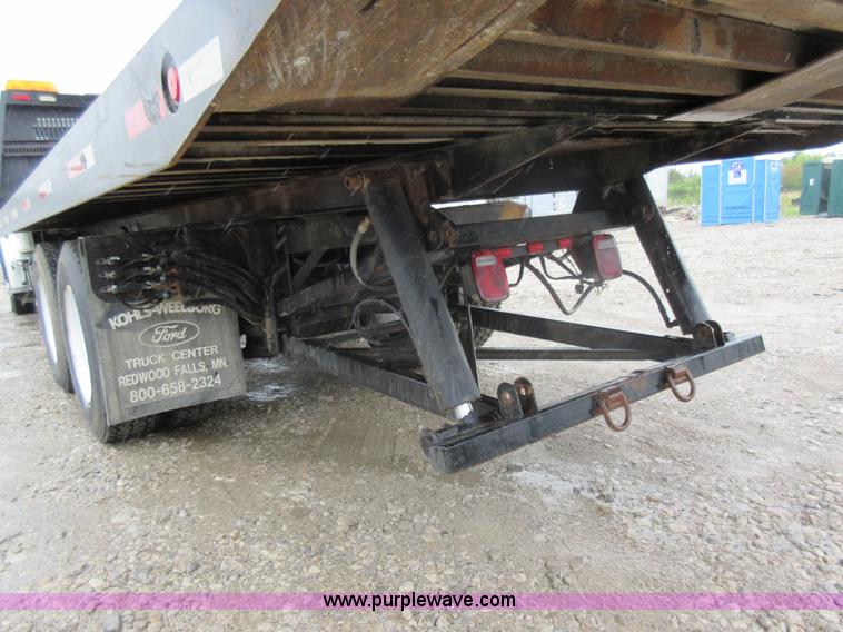 image for item AO9124 2003 Freightliner FL80 roll back truck