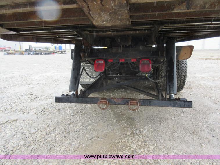 image for item AO9124 2003 Freightliner FL80 roll back truck