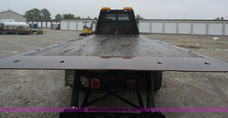 image for item AO9124 2003 Freightliner FL80 roll back truck