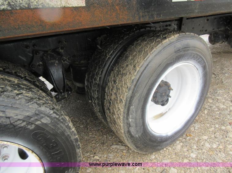 image for item AO9124 2003 Freightliner FL80 roll back truck