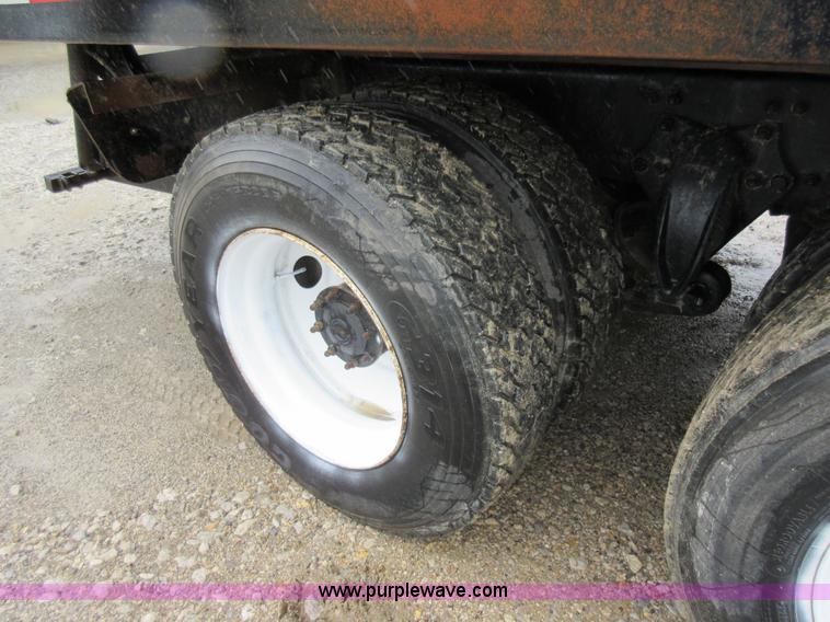 image for item AO9124 2003 Freightliner FL80 roll back truck