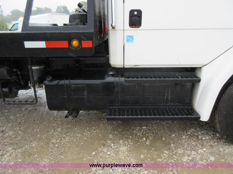 image for item AO9124 2003 Freightliner FL80 roll back truck