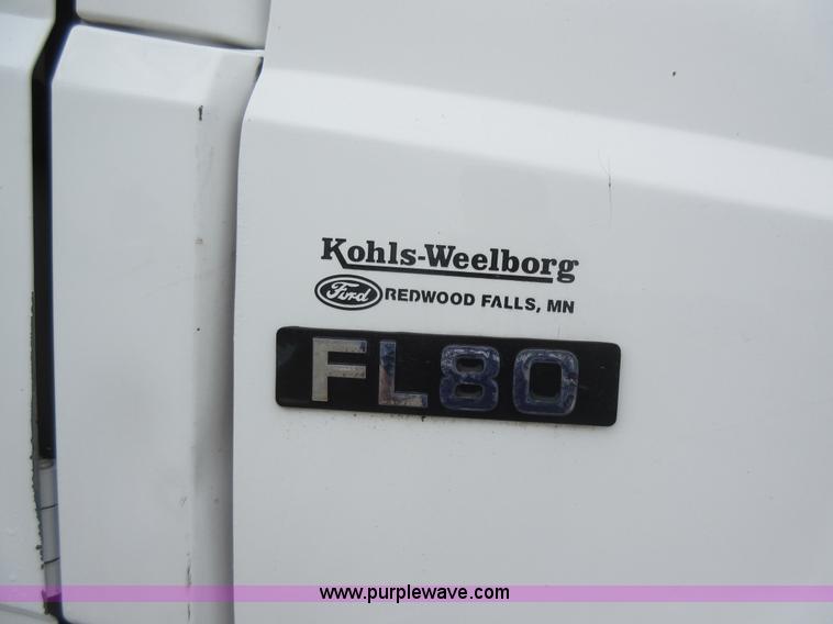 image for item AO9124 2003 Freightliner FL80 roll back truck