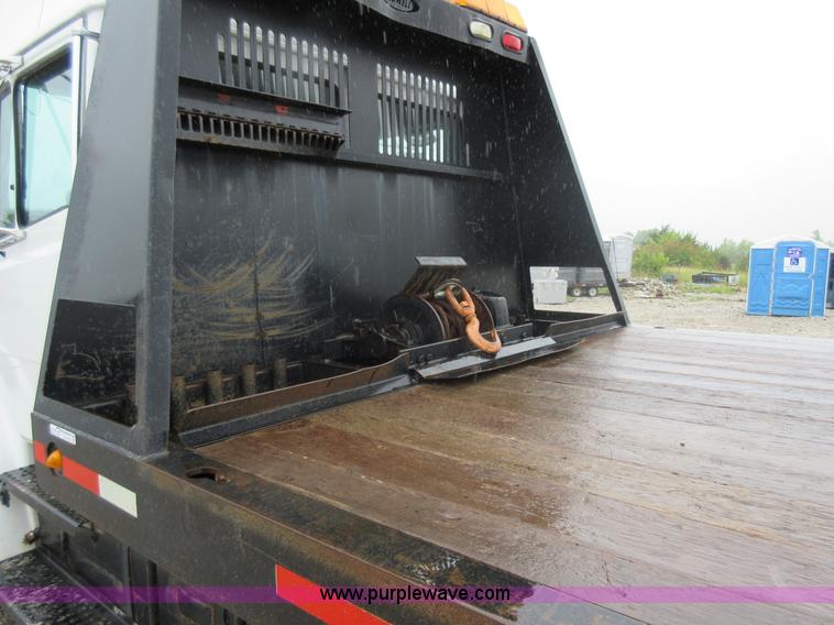 image for item AO9124 2003 Freightliner FL80 roll back truck