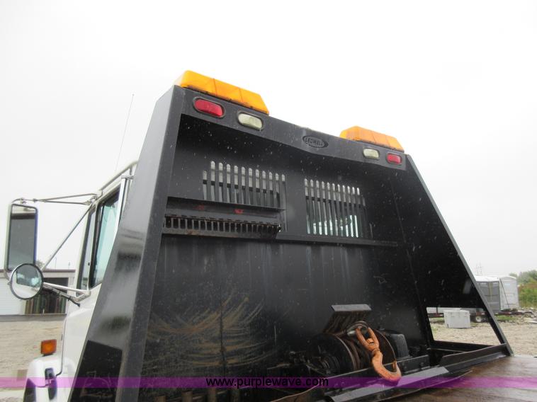 image for item AO9124 2003 Freightliner FL80 roll back truck