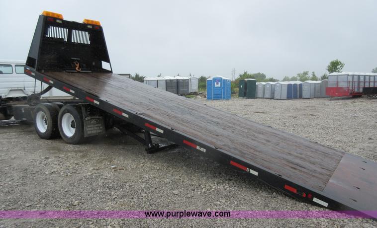 image for item AO9124 2003 Freightliner FL80 roll back truck