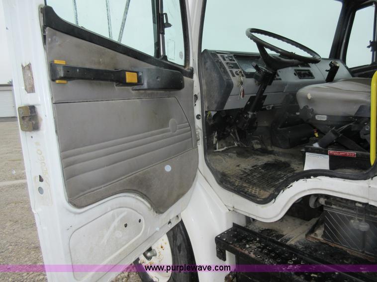 image for item AO9124 2003 Freightliner FL80 roll back truck