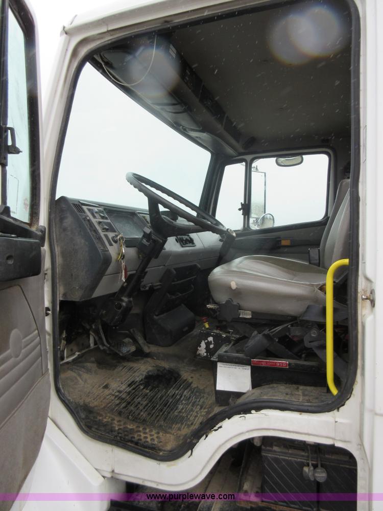 image for item AO9124 2003 Freightliner FL80 roll back truck