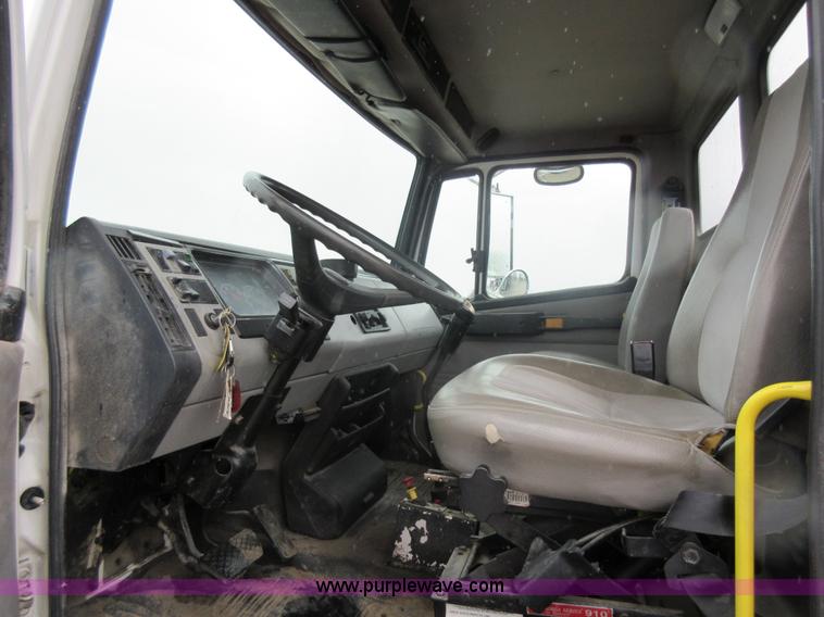 image for item AO9124 2003 Freightliner FL80 roll back truck