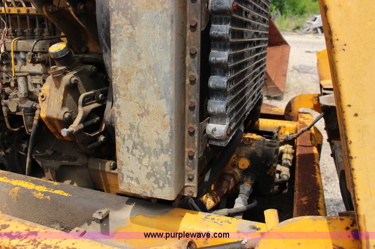 image for item F7983 John Deere 762 elevating scraper