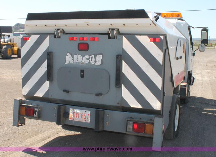 image for item J1478 2000 Isuzu NPRHD street sweeper