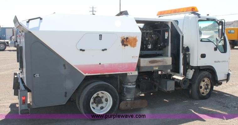 image for item J1478 2000 Isuzu NPRHD street sweeper