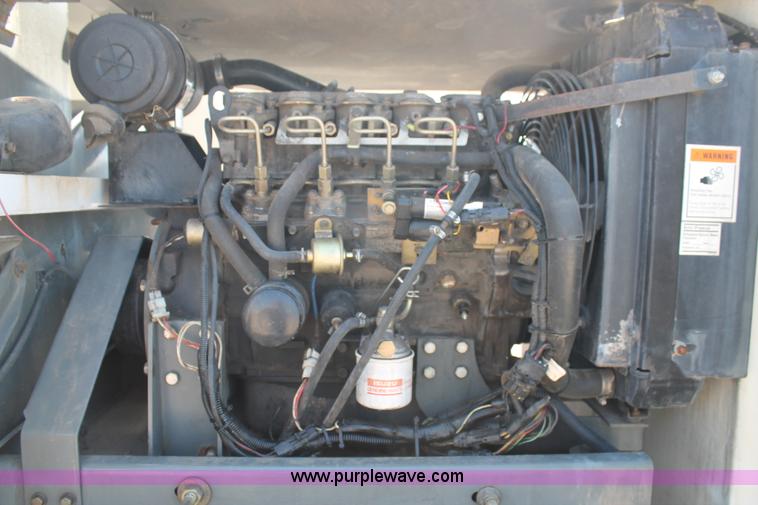 image for item J1478 2000 Isuzu NPRHD street sweeper