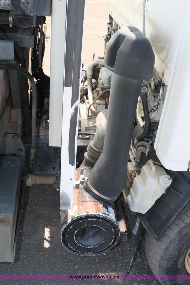 image for item J1478 2000 Isuzu NPRHD street sweeper