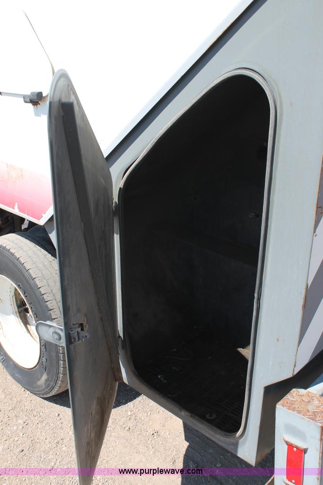 image for item J1478 2000 Isuzu NPRHD street sweeper