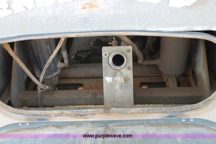 image for item J1478 2000 Isuzu NPRHD street sweeper