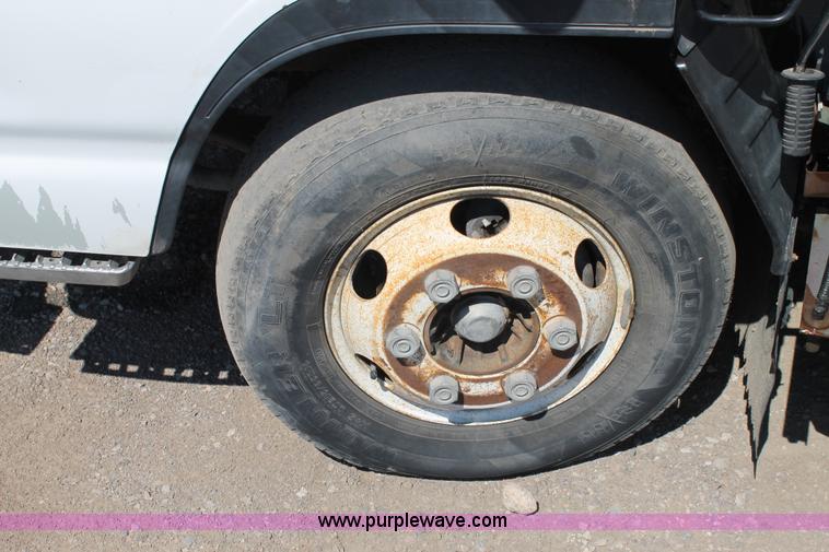 image for item J1478 2000 Isuzu NPRHD street sweeper