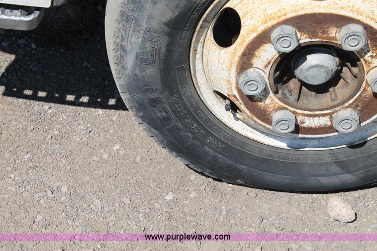 image for item J1478 2000 Isuzu NPRHD street sweeper