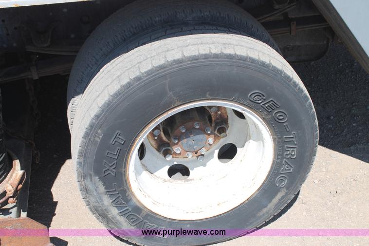 image for item J1478 2000 Isuzu NPRHD street sweeper