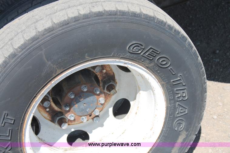 image for item J1478 2000 Isuzu NPRHD street sweeper