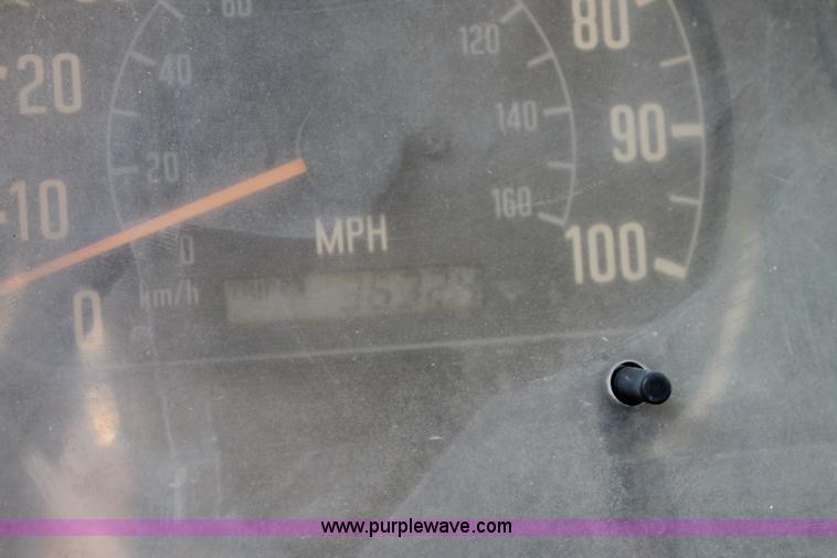 image for item J1478 2000 Isuzu NPRHD street sweeper