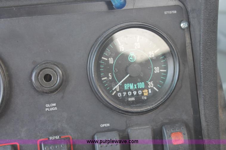 image for item J1478 2000 Isuzu NPRHD street sweeper