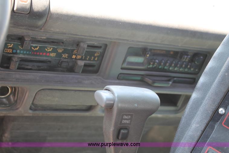 image for item J1478 2000 Isuzu NPRHD street sweeper