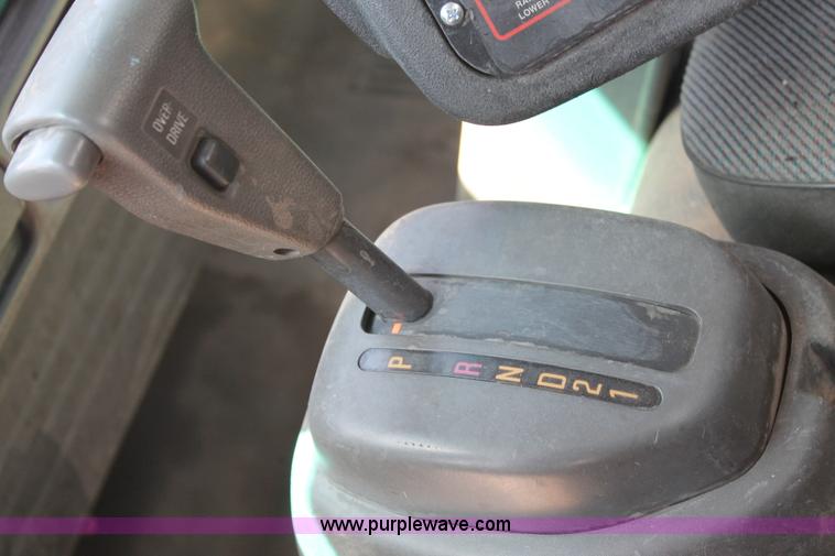 image for item J1478 2000 Isuzu NPRHD street sweeper