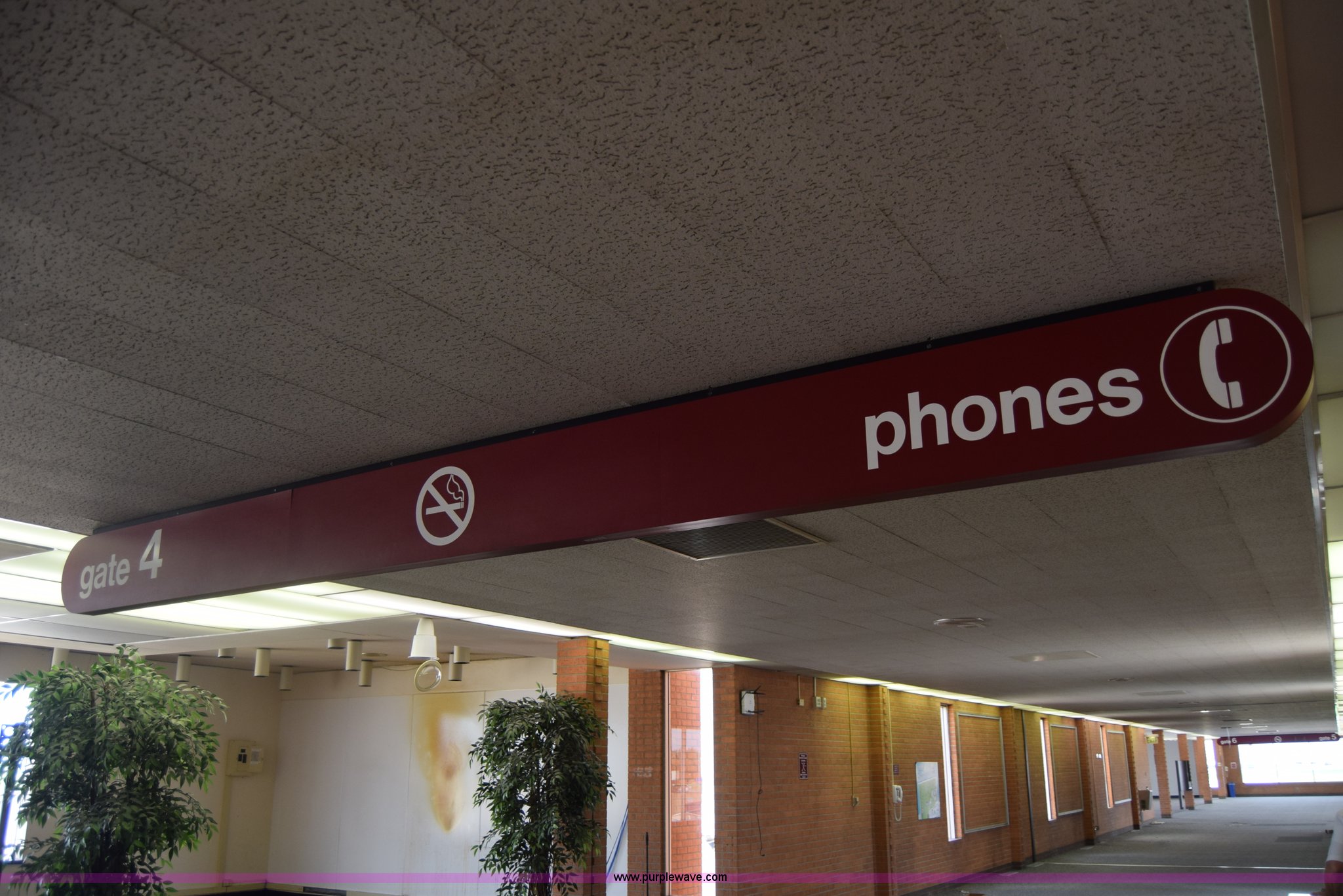 (6) concourse signs in Wichita, KS | Item BR9695 sold | Purple Wave