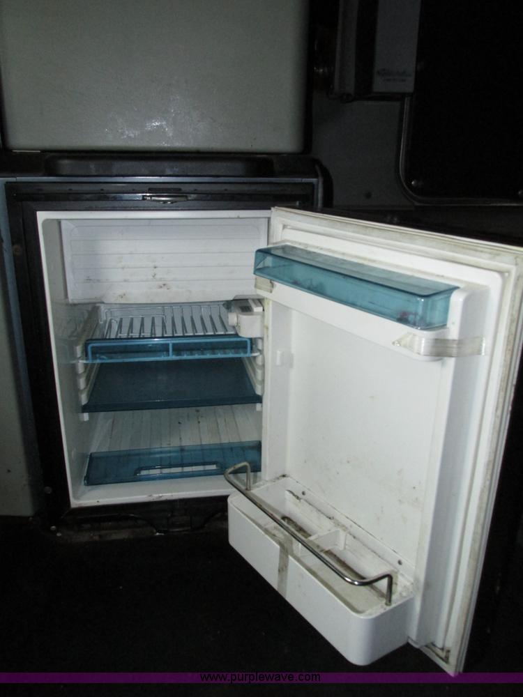 image for item H4560 1999 Kenworth W900L semi truck