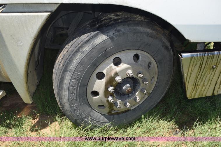 image for item J8500 2002 Freightliner Century Class ST120 semi truck