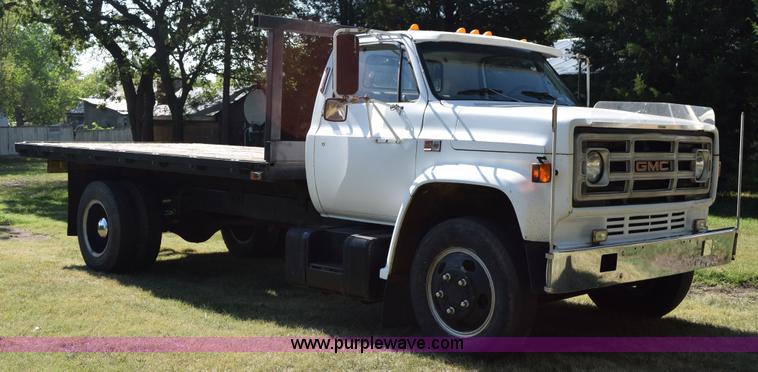 image for item K6171 1987 GMC 6000 flatbed truck